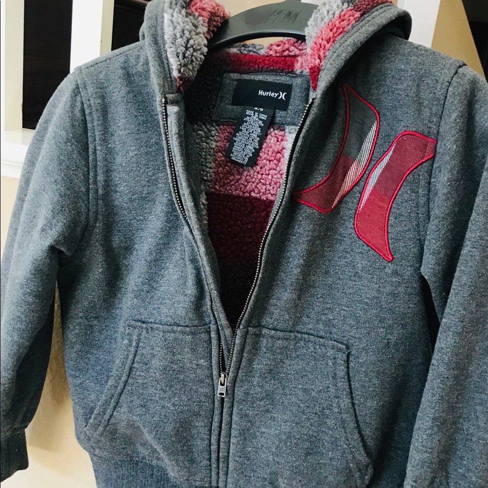 Hurley sherpa lined zip up hoodie.